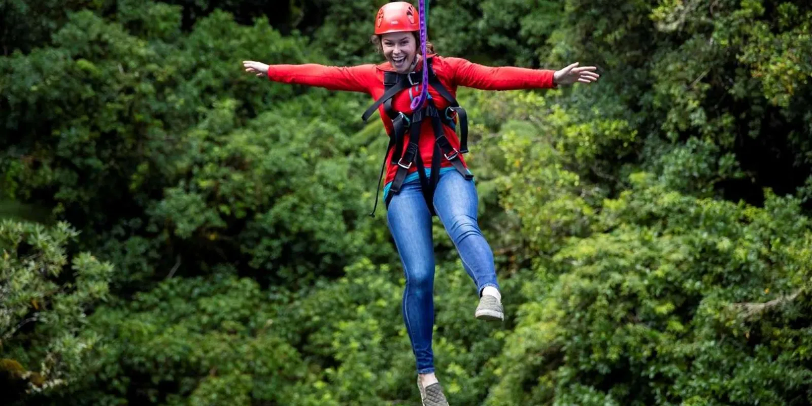 A guest on the forest zipline at Rotorua's Redwoods, another afternoon add-on option